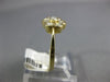 ESTATE .51CT DIAMOND 14K YELLOW GOLD 3D SEVEN STONE FLOWER BEZEL ETOILE FUN RING
