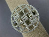 ESTATE LARGE .66CT DIAMOND 18KT WHITE GOLD ROUND AND BAGUETTE CIRCULAR FUN RING