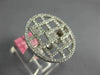 ESTATE LARGE .66CT DIAMOND 18KT WHITE GOLD ROUND AND BAGUETTE CIRCULAR FUN RING