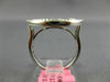ESTATE LARGE .66CT DIAMOND 18KT WHITE GOLD ROUND AND BAGUETTE CIRCULAR FUN RING