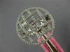 ESTATE LARGE .66CT DIAMOND 18KT WHITE GOLD ROUND AND BAGUETTE CIRCULAR FUN RING