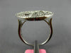 ESTATE LARGE .66CT DIAMOND 18KT WHITE GOLD ROUND AND BAGUETTE CIRCULAR FUN RING