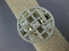 ESTATE LARGE .66CT DIAMOND 18KT WHITE GOLD ROUND AND BAGUETTE CIRCULAR FUN RING