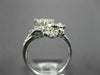 ESTATE WIDE .63CT DIAMOND 18K WHITE GOLD ROUND & BAGUETTE FLOWER SNOWFLAKE RING