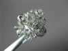 ESTATE WIDE .63CT DIAMOND 18K WHITE GOLD ROUND & BAGUETTE FLOWER SNOWFLAKE RING