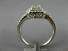 LARGE .62CT DIAMOND 18KT WHITE GOLD 3D ROUND & BAGUETTE SQUARE ANNIVERSARY RING