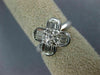 ESTATE .71CT DIAMOND 18KT WHITE GOLD ROUND & BAGUETTE 4 LEAF CLOVER FLOWER RING