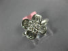 ESTATE .71CT DIAMOND 18KT WHITE GOLD ROUND & BAGUETTE 4 LEAF CLOVER FLOWER RING