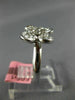 ESTATE .71CT DIAMOND 18KT WHITE GOLD ROUND & BAGUETTE 4 LEAF CLOVER FLOWER RING