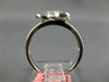 ESTATE .71CT DIAMOND 18KT WHITE GOLD ROUND & BAGUETTE 4 LEAF CLOVER FLOWER RING