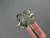 ESTATE .71CT DIAMOND 18KT WHITE GOLD ROUND & BAGUETTE 4 LEAF CLOVER FLOWER RING