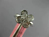 ESTATE .71CT DIAMOND 18KT WHITE GOLD ROUND & BAGUETTE 4 LEAF CLOVER FLOWER RING