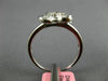 ESTATE .71CT DIAMOND 18KT WHITE GOLD ROUND & BAGUETTE 4 LEAF CLOVER FLOWER RING