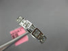 ESTATE .47CT DIAMOND 18K WHITE GOLD PRINCESS & BAGUETTE CHANNEL ANNIVERSARY RING