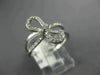 ESTATE WIDE .27CT ROUND DIAMOND 18K WHITE GOLD 3D CLASSIC BOW INFINITY FUN RING