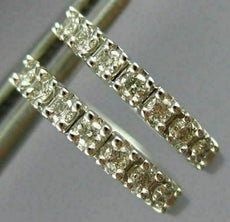 ESTATE .20CT DIAMOND 14KT WHITE GOLD ROUND CLASSIC 4 PRONG HUGGIE HOOP EARRINGS