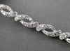 ESTATE 1.50CT DIAMOND 14KT WHITE GOLD 3D ROUND LOVE KNOT INFINITY BRACELET