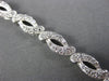 ESTATE 1.50CT DIAMOND 14KT WHITE GOLD 3D ROUND LOVE KNOT INFINITY BRACELET