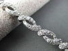 ESTATE 1.50CT DIAMOND 14KT WHITE GOLD 3D ROUND LOVE KNOT INFINITY BRACELET