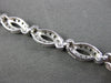 ESTATE 1.50CT DIAMOND 14KT WHITE GOLD 3D ROUND LOVE KNOT INFINITY BRACELET