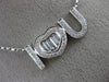 ESTATE .52CT ROUND & BAGUETTE DIAMOND 18KT WHITE GOLD I LOVE YOU HEART NECKLACE