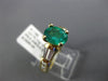 2.04CT BAGUETTE PRINCESS DIAMOND & EMERALD 14KT YELLOW GOLD OVAL ENGAGEMENT RING