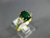 2.0CT DIAMOND & AAA EMERALD 14KT YELLOW GOLD 3D OVAL & TRILLION ENGAGEMENT RING