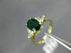2.0CT DIAMOND & AAA EMERALD 14KT YELLOW GOLD 3D OVAL & TRILLION ENGAGEMENT RING