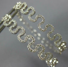 ESTATE WIDE .62CT DIAMOND 18KT WHITE GOLD 3D MULTI WAVE HANGING HOOP EARRINGS