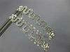ESTATE WIDE .62CT DIAMOND 18KT WHITE GOLD 3D MULTI WAVE HANGING HOOP EARRINGS
