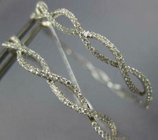 ESTATE LARGE .70CT DIAMOND 18KT WHITE GOLD INFINITY HANGING HOOP LOVE EARRINGS