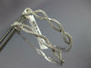ESTATE LARGE .70CT DIAMOND 18KT WHITE GOLD INFINITY HANGING HOOP LOVE EARRINGS