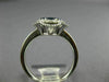 ESTATE WIDE .64CT DIAMOND & AAA SAPPHIRE 18KT WHITE GOLD 4 LEAF CLOVER LOVE RING