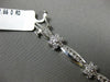 ESTATE WIDE 2.66CT DIAMOND 14KT WHITE GOLD ROUND FLOWER CHANNEL TENNIS BRACELET