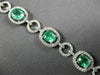 ESTATE WIDE 9.57CT DIAMOND & AAA EMERALD 18KT WHITE GOLD 3D HALO TENNIS BRACELET
