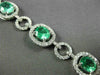 ESTATE WIDE 9.57CT DIAMOND & AAA EMERALD 18KT WHITE GOLD 3D HALO TENNIS BRACELET