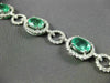 ESTATE WIDE 9.57CT DIAMOND & AAA EMERALD 18KT WHITE GOLD 3D HALO TENNIS BRACELET