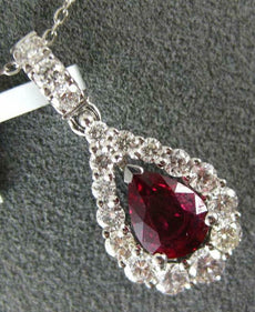 1.26CT DIAMOND & AAA RUBY 18KT WHITE GOLD ROUND & PEAR SHAPE TEAR DROP PENDANT