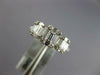 ESTATE .57CT DIAMOND 18K WHITE GOLD 3D ROUND & BAGUETTE PAST PRESENT FUTURE RING