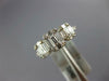 ESTATE .57CT DIAMOND 18K WHITE GOLD 3D ROUND & BAGUETTE PAST PRESENT FUTURE RING