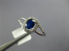 ESTATE .62CT DIAMOND & AAA SAPPHIRE 14KT WHITE GOLD 3D OVAL HALO ENGAGEMENT RING