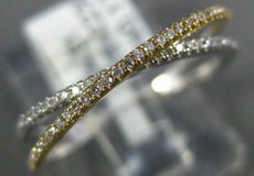ESTATE .17CT DIAMOND 18K WHITE AND YELLOW GOLD 3D CRISS CROSS INFINITY LOVE RING