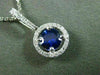 ESTATE .80CT DIAMOND & SAPPHIRE 18KT WHITE GOLD CLASSIC ROUND FLOATING PENDANT