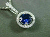ESTATE .80CT DIAMOND & SAPPHIRE 18KT WHITE GOLD CLASSIC ROUND FLOATING PENDANT