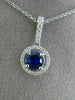 ESTATE .80CT DIAMOND & SAPPHIRE 18KT WHITE GOLD CLASSIC ROUND FLOATING PENDANT