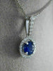 ESTATE .80CT DIAMOND & SAPPHIRE 18KT WHITE GOLD CLASSIC ROUND FLOATING PENDANT