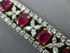 ESTATE WIDE 24.15CT DIAMOND & AAA RUBY 18KT GOLD & PLATINUM 3D TENNIS BRACELET