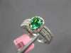 ESTATE .82CT DIAMOND & AAA OVAL CUT EMERALD 18K 2 TONE GOLD HALO ENGAGEMENT RING