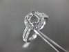 ESTATE .69CT DIAMOND 14KT WHITE GOLD FOUR PRONG HALO SEMI MOUNT ENGAGEMENT RING