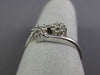 ESTATE .25CT ROUND DIAMOND 14KT WHITE GOLD 3D DOUBLE FLOWE INFINITY LOVE RING